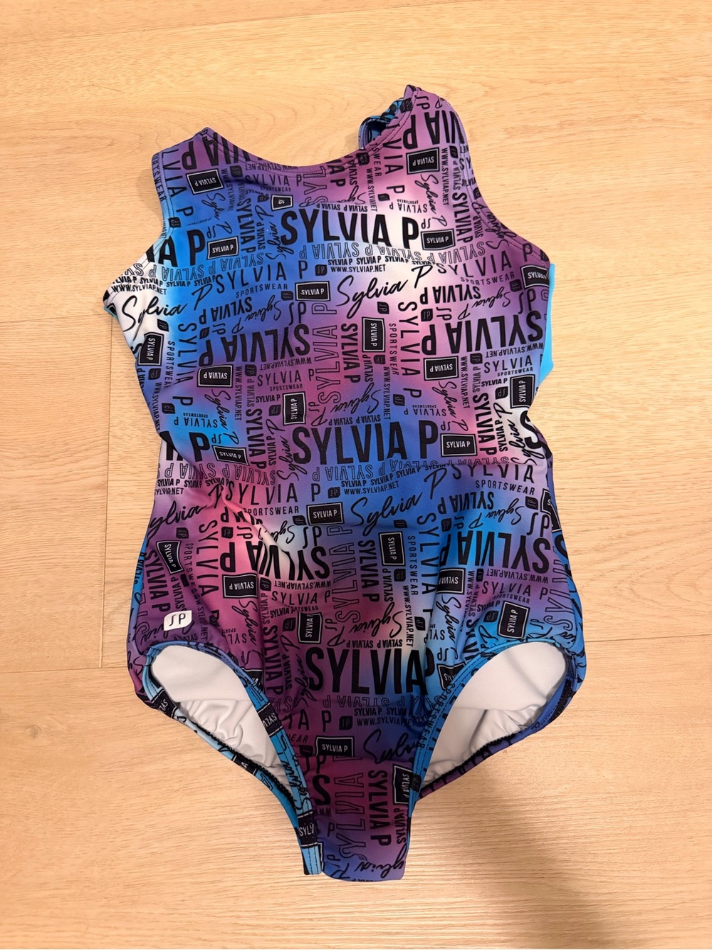 Sylvia p gymnastics leotard size 8 in purple and blue with strappy back